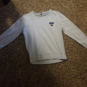 Light blue H&M "Don't Hate Meditate Top"